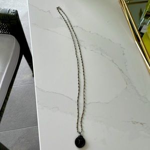 Monogram T necklace. 18 inches long including pendant.Good quality boutique item